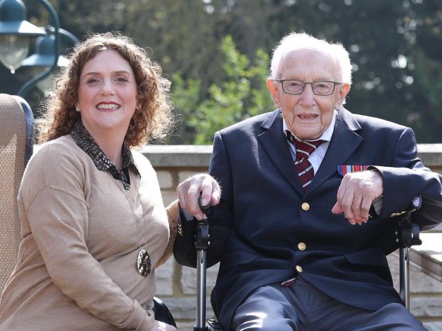 99 year old retired British Army Captain Tom Moore photographed in the garden of his home near Milton Keynes with daughter Hannah Ingram-Moore. Tom has raised over ?12 Million for the NHS by attempting to walk the length of his garden 100 times before his 100th birthday this month. Captain Tom Moore photoshoot, Milton Keynes, UK - 16 Apr 2020Mandatory Credit: Photo by John Lawrence/REX/Shutterstock (10628395c)