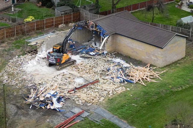 Work continues to demolish an unauthorised spa pool block at the home of Hannah Ingram-Moore, the daughter of the late Captain Sir Tom Moore, at Marston Moretaine, Bedfordshire. Picture date: Monday February 5, 2024. PA Photo. See PA story SOCIAL CaptainTom. Photo credit should read: Jacob King/PA Wire