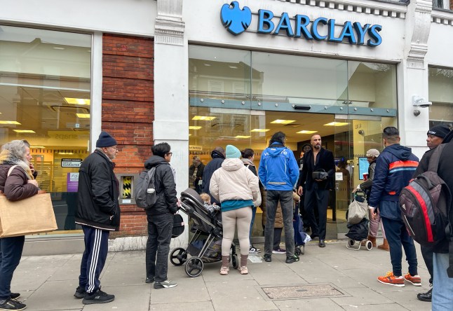 ?? Licensed to London News Pictures. 01/02/2025. London, UK. Customers queue outside the Wood Green Barclays Bank branch in north London as they face ongoing issues due to a major bank's IT outage. The outage is preventing payments through the branch, online banking, and the app. Additionally, Barclays is unable to assist customers via phone or their online banking service. Photo credit: Dinendra Haria/LNP