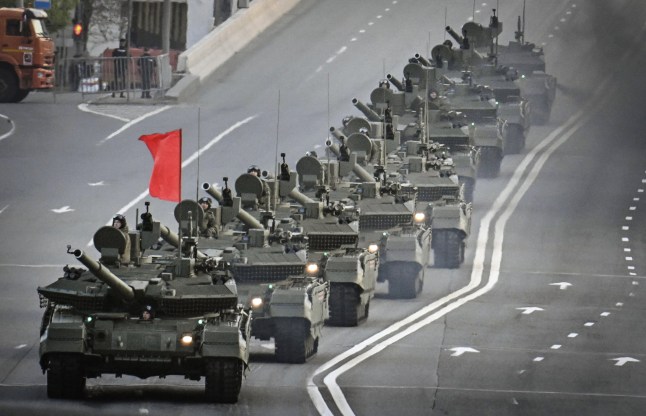 Russian T-90M tanks drive through central Moscow during a rehearsal for the Victory Day parade where Russia will celebrate the 80th anniversary of the 1945 defeat of Nazi Germany, on May 3, 2025. Russia will mark "Victory Day" on May 9 with a huge military parade of troops and hardware on Red Square, presided over by President Vladimir Putin. (Photo by Alexander NEMENOV / AFP) (Photo by ALEXANDER NEMENOV/AFP via Getty Images)