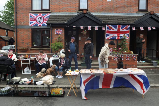 Residents take part in a street party during bank holiday celebrations commemorating the 80th anniversary of Victory in Europe (VE) Day, in Manchester, Britain, May 5, 2025. REUTERS/Temilade Adelaja