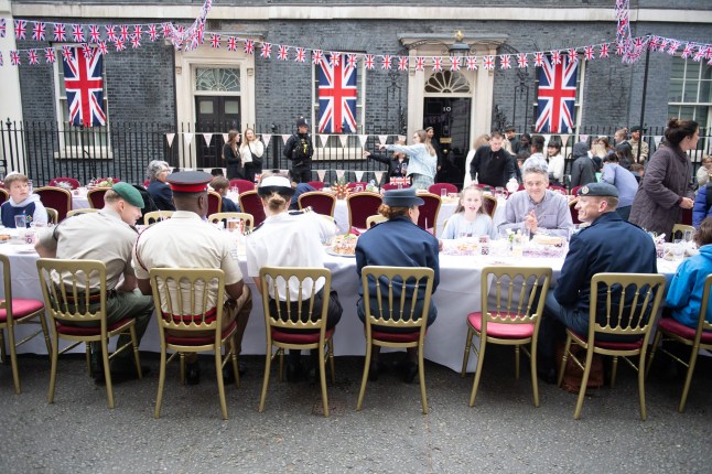 Members of the Armed Forces attend a Street Party hosted by British Prime Minister Sir Keir Starmer to celebrate the 80th Anniversary of VE Day at Downing Street in London, England, UK on Monday 5 May, 2025., Credit:Justin Ng / Avalon