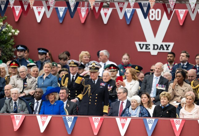 LONDON, ENGLAND - MAY 05: King Charles III and Queen Camilla during the military procession to mark the 80th anniversary of VE Day on May 05, 2025 in London, England. The King and Queen, joined by Members of the Royal Family, will take part in events from May 5th to May 8th to commemorate the 80th anniversary of VE Day, which signalled the end of the Second World War in Europe. (Photo by Samir Hussein/WireImage)